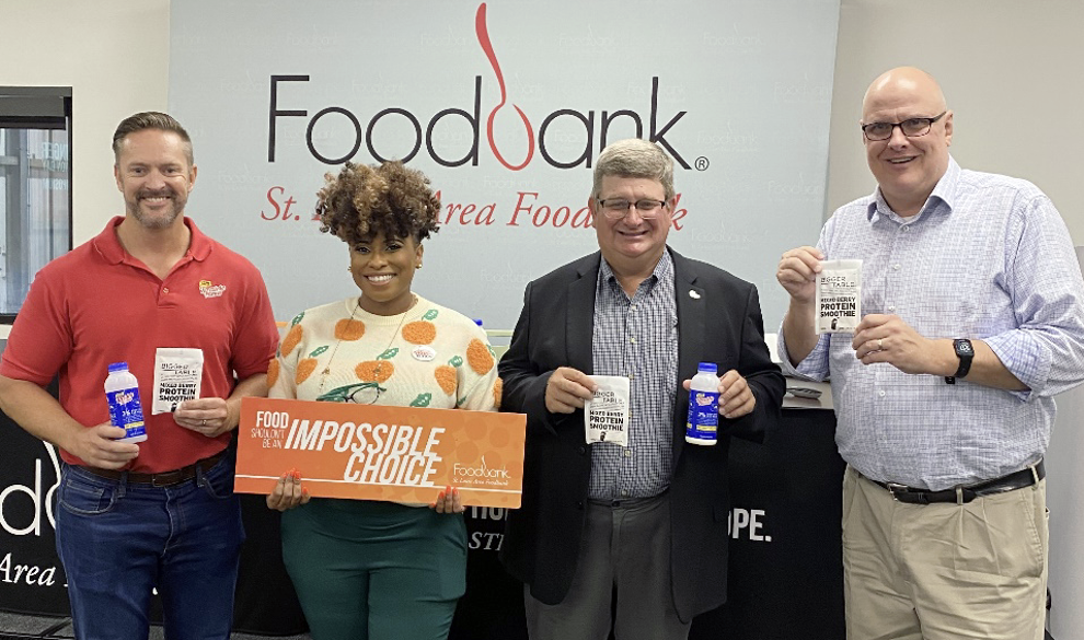 Photo Caption from L to R: Darin Copeland, Prairie Farms Dairy; Jasmine Evans, St. Louis Area Foodbank, Derek England, Prairie Farms Dairy; Alan Reed, Bigger Table. 