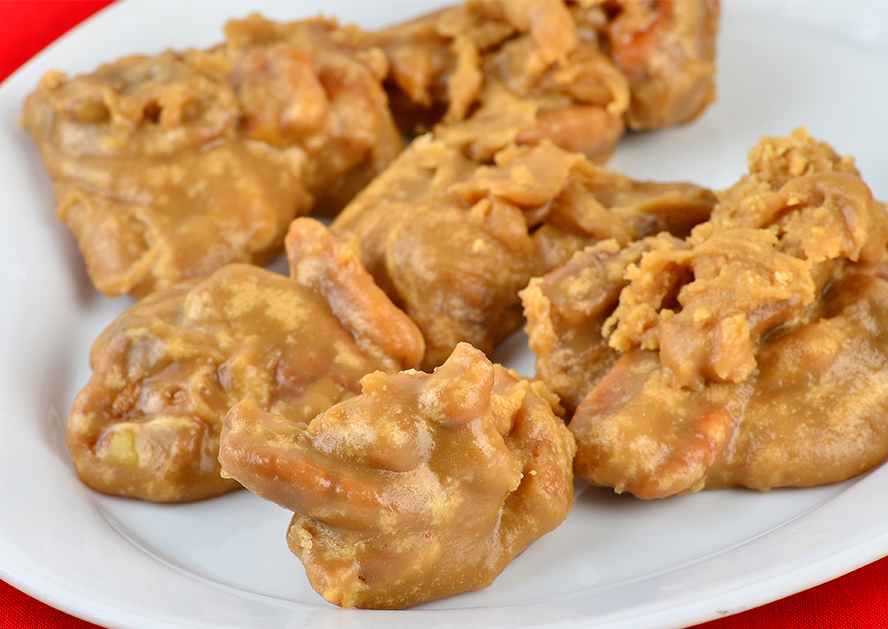Pecan pralines on a white plate