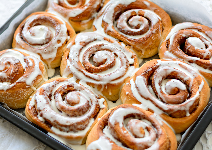 Tray of iced cinnamon rolls