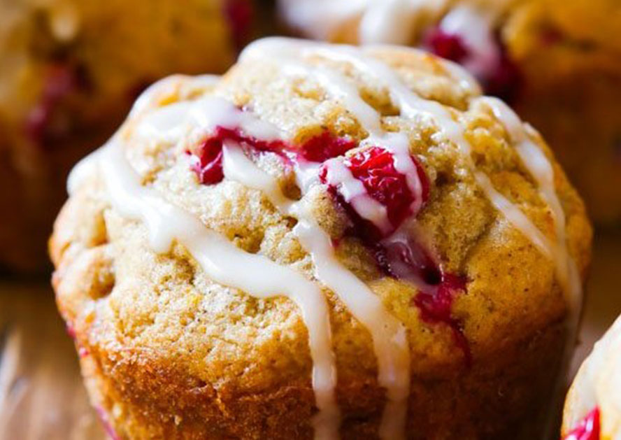 Cranberry muffin with white icing drizzle