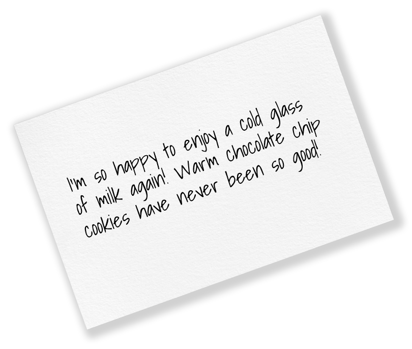 Handwritten note reading: “I’m so happy to enjoy a cold glass of milk again! Warm chocolate chip cookies have never been so good!”