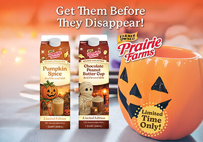 Prairie Farms Pumpkin Spice and Chocolate Peanut Butter Cup limited-edition milk cartons beside a pumpkin-shaped mug with the message “Get Them Before They Disappear!”